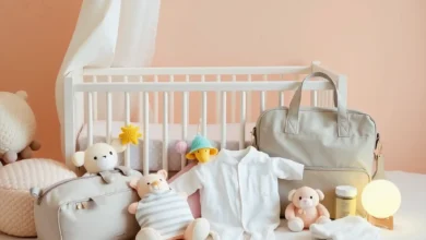 A cozy nursery scene featuring a beautifully arranged selection of essential baby supplies, including a soft crib, colorful plush toys, a stylish diaper bag, organic baby clothing, and a gentle nightlight, all set against a warm